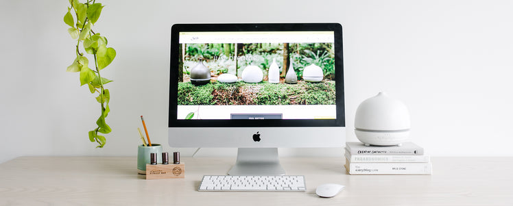 Monitor placed with a Saje diffuser