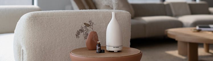 Aroma Om Diffuser placed on bedside table