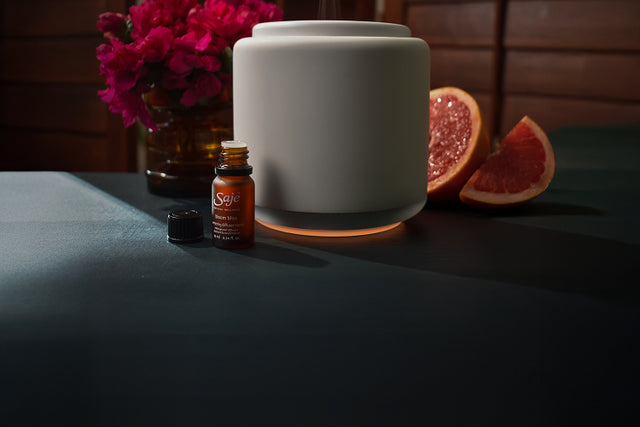 Saje diffuser blend kits tile across a light green background, showing the assortment of collections.