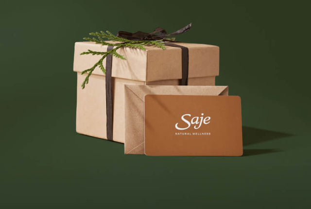 A Saje gift card against a green background