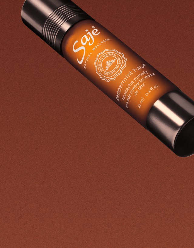 Peppermint Halo Roll-On against a brown background