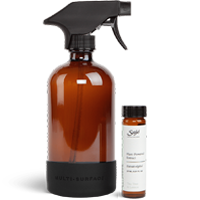 A Saje Multi-surface cleaning kit that includes a 500 ml | 16.9 fl oz. refillable glass spray bottle and 27 ml |  0.91 fl oz. natural cleaning extract.